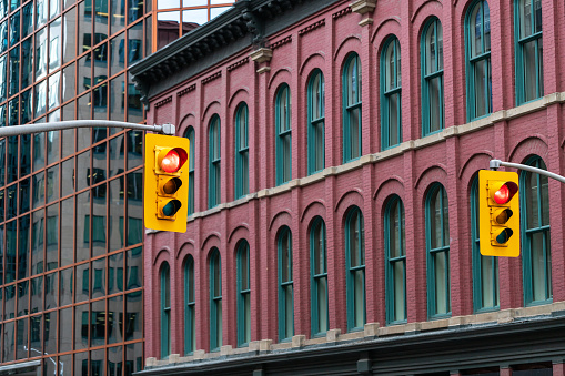 Traffic lights against building in downtown district of Ottawa, Canada.