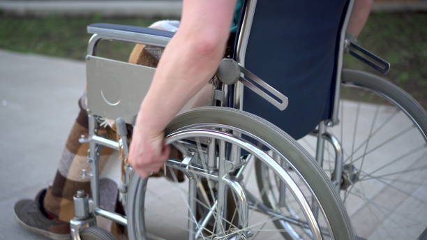 istock Young man in wheelchair 1444599860