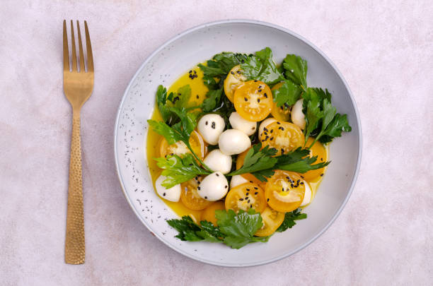 istock Yellow tomatoes, mozzarella and parsley 1444612703