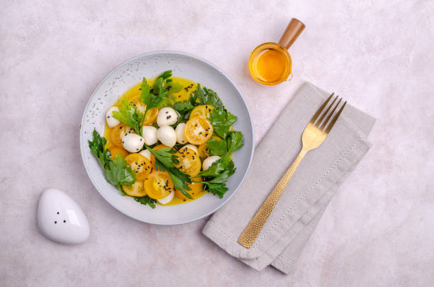 istock Yellow tomatoes, mozzarella and parsley 1444612717