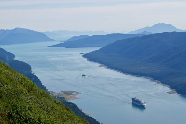 istock mountains water channel and a large cruise ship 1444614016