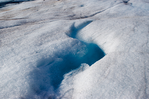 a crack in a glacier ice