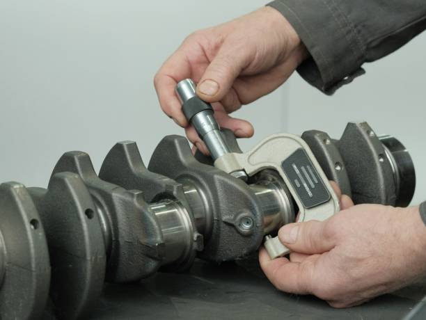 istock The mechanic measures the crankshaft neck. 1444618653