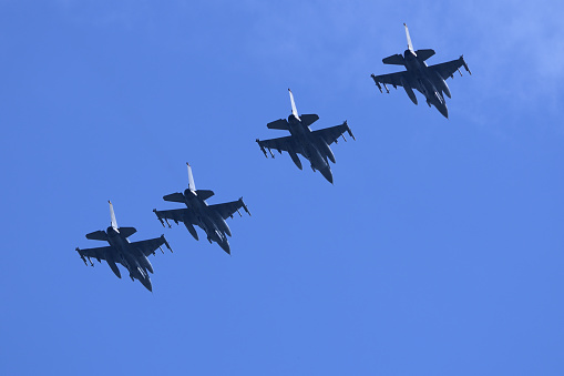 Aomori Prefecture, Japan - September 07, 2014: United States Air Force Lockheed Martin F-16C Fighting Falcon multirole fighter aircraft flying in formation.