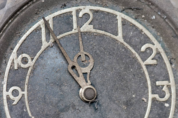 istock The dial of an old clock. Five minutes to midnight. 1444657654