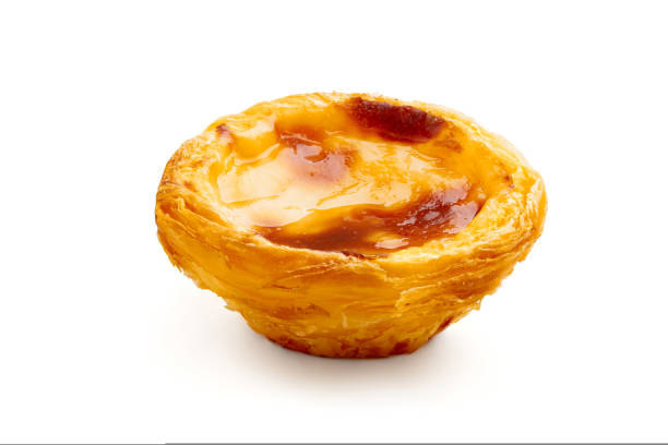 Traditional Portuguese egg tart dessert Pasteis Pastel de nata or Pasteis de Belem on white background. Local pastry cafeteria concept
