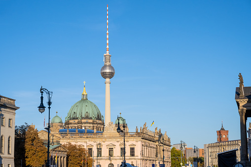 The famous TV Tower and some historic buildings at the Unter den Linden boulevard