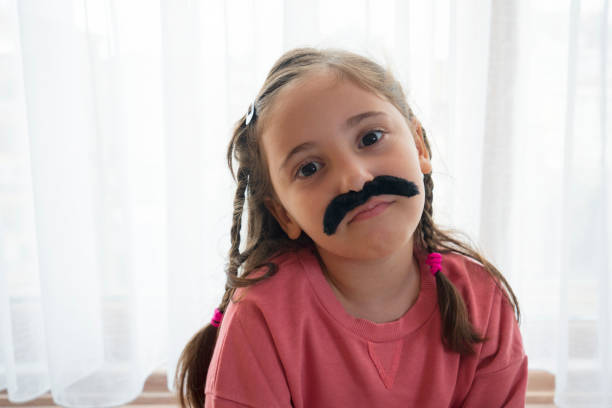 istock Mustached Little Girl 1444674497