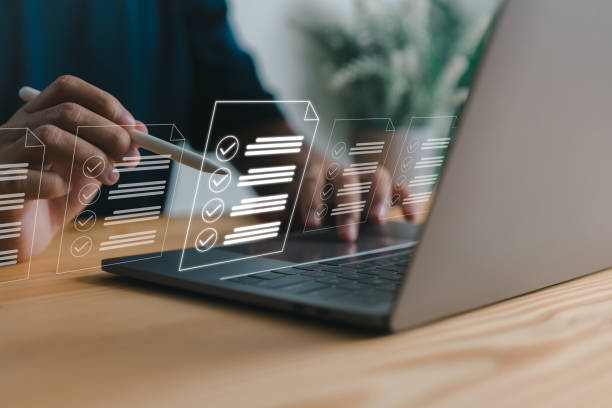 istock Checklist and clipboard task management, online survey form completion Corporate business technology includes a document management system (DMS) and process automation to efficiently manage files. 1444674650