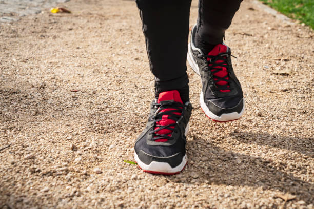 Men running feet with sport shoes.
