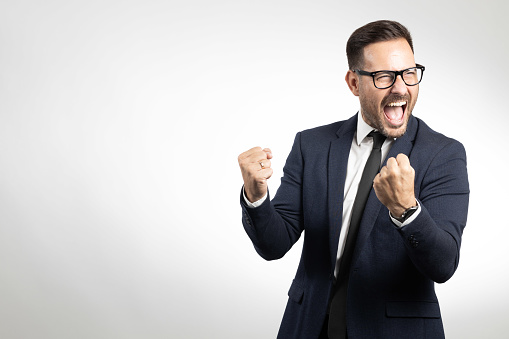 Business man studio portrait on white background, showing confident and happy faces