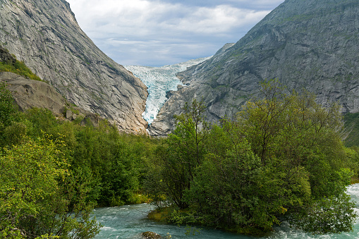 Glacier melting stream, Norway, National park Jostedalsbreen mountain landscape view.