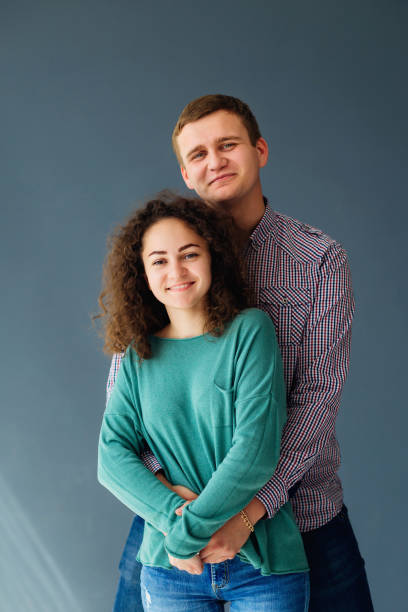 istock Smiling european couple in the studio 1444685102