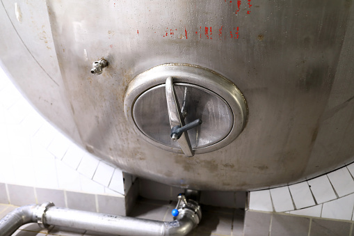 Details of metal tank in a brewery