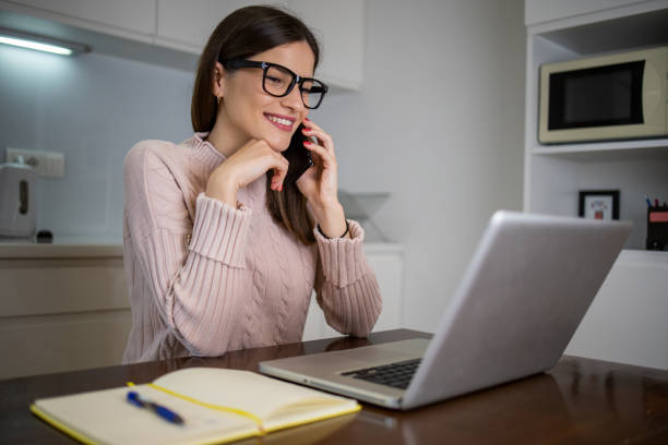 istock Young woman working from home 1444696366