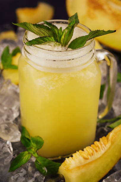 istock glass of melon smoothie with mint leaves 1444696711