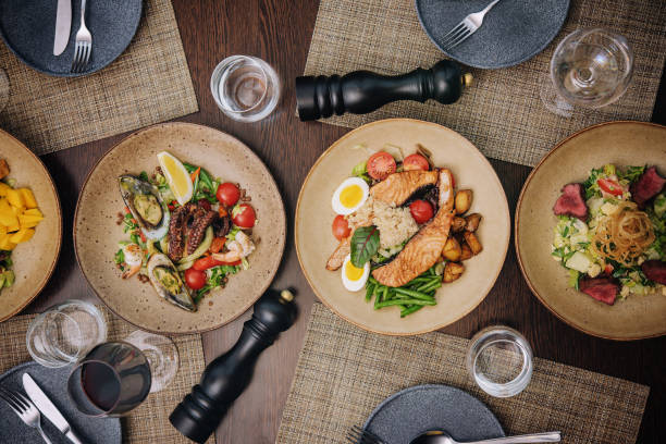 istock different types of seafood dishes with white and red wine 1444697010