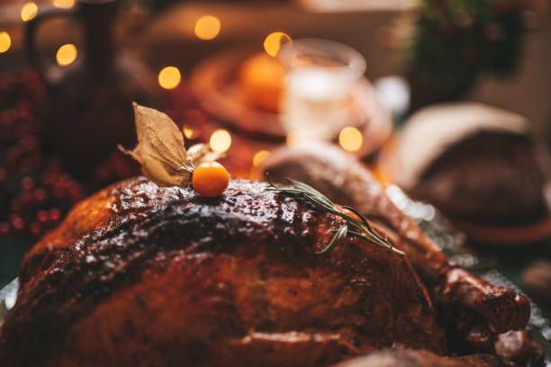 istock Thanksgiving holiday dinner table setting with fall decoration and pumpkins 1444700163
