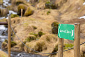 directional sign to the Gljúfurárfoss, also called Gljúfrabúi, a waterfall half hidden in a gorge