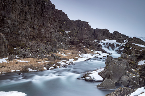 Mountain river in the winter season, covered with snow