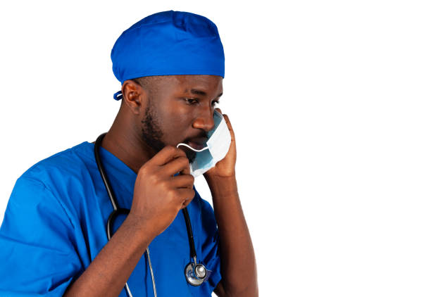An isolated shot of an african american nurse wearing a surgical mask