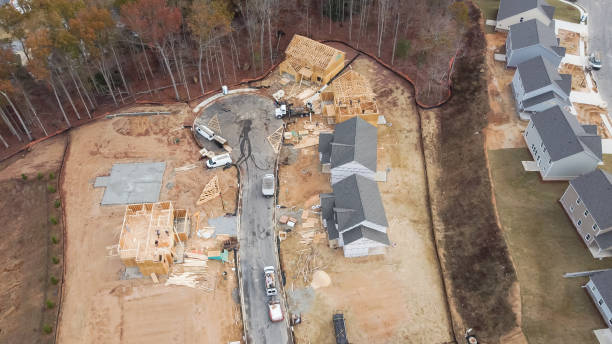 aerial view wooden house construction with joints and trusses, garble roof, lumber frame and enveloping houses outside atlanta, ga, usa - garble imagens e fotografias de stock