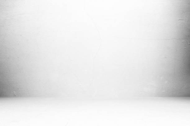 istock Abstract White Concrete Room with Spotlight from the Top. 1444723822