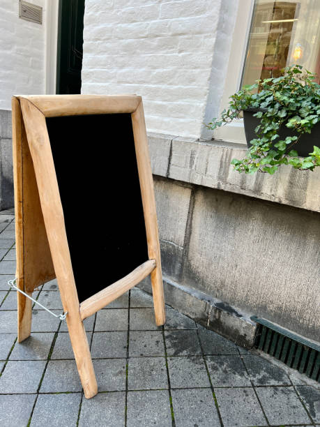 istock blank sign board in front of a shop 1444724303