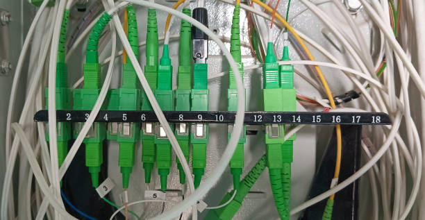 istock Technology center with fiber optic equipment. Servers in a datacenter. Server room with equipments. Technology center with fiber optic equipment. 1444727513
