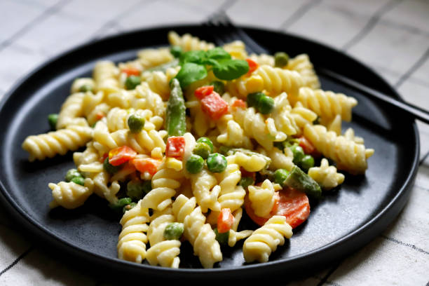 istock Pasta Salad with vegetables with sauce and spices. 1444737214
