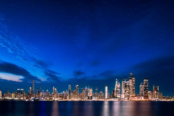 Midtown Manhattan Cityscape under a starry sky