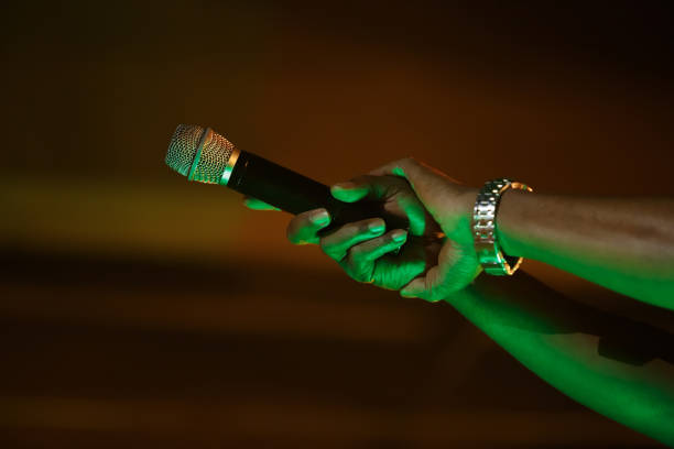 Microphone against an orange background