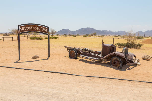 abandoned car wraks of solitare, namibia. - solitare imagens e fotografias de stock