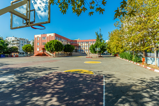 School sports court with basketball hoops and no people