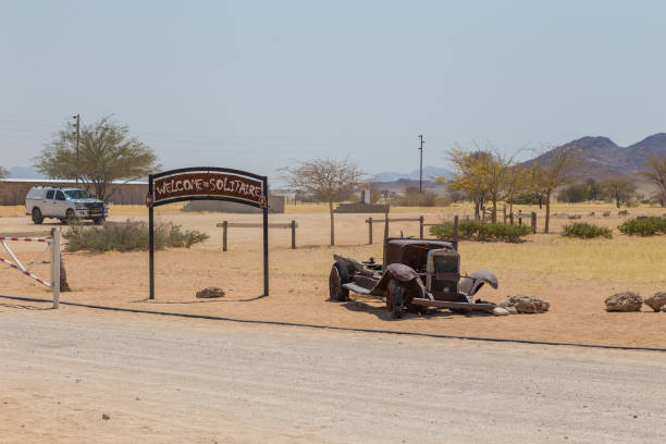 abandoned car wraks of solitare, namibia. - solitare imagens e fotografias de stock