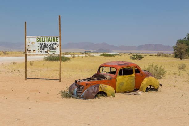 abandoned car wraks of solitare, namibia. - solitare imagens e fotografias de stock