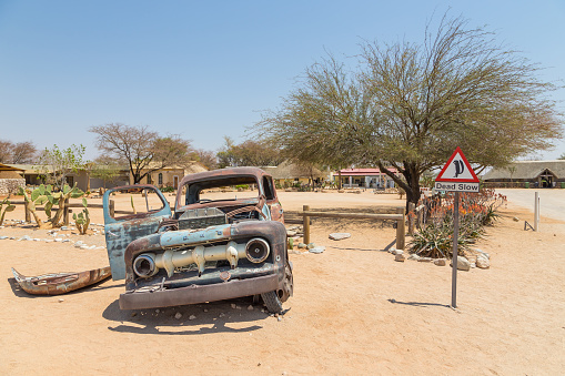 Solitaire, Namibia - 01 October 2018: Abandoned car wraks of Solitare near a service station at Solitaire in the Namib Desert, Namib-Naukluft National Park.