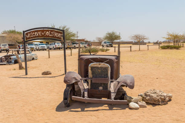 abandoned car wraks of solitare, namibia. - solitare imagens e fotografias de stock