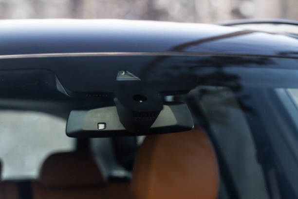 istock Windshield rain and light sensors of modern car. Car rain sensor. 1444764104