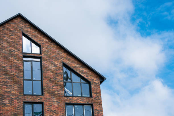 istock A beautiful brick building with large windows. 1444767074