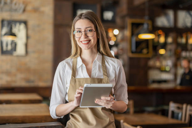 istock Female Coffee Shop Owner Looking at Camera 1444770194
