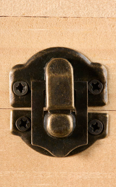 istock Metal lock on wood background. 1444770875
