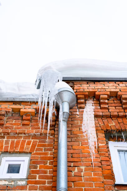 istock Close-up of icicles on the roof. 1444771896