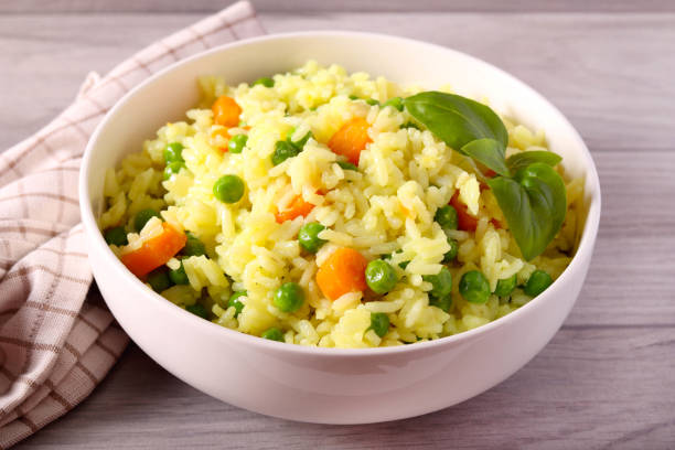 istock Rice with carrots and peas 1444772108