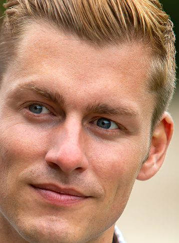 close-up of handsome young blond man