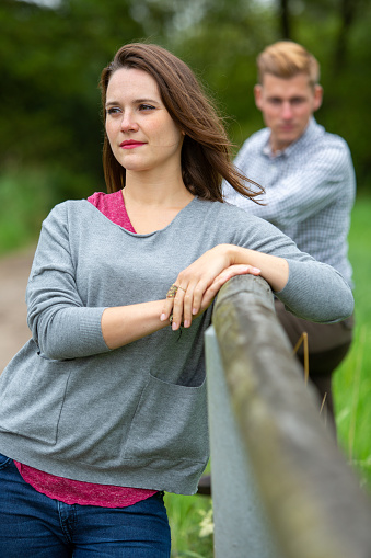 portrait of young couple outside in nature