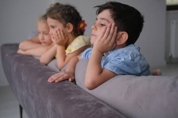 istock Happy little siblings having fun playing together at home 1444786960