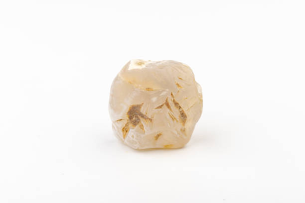 istock Multicolored gemstone, tumbled mineral. Bostwan agate of various sizes on a white background. 1444789239