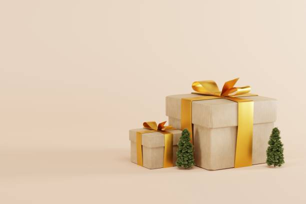 istock Gift boxes on a light background and a small Christmas tree next to it. 1444801839