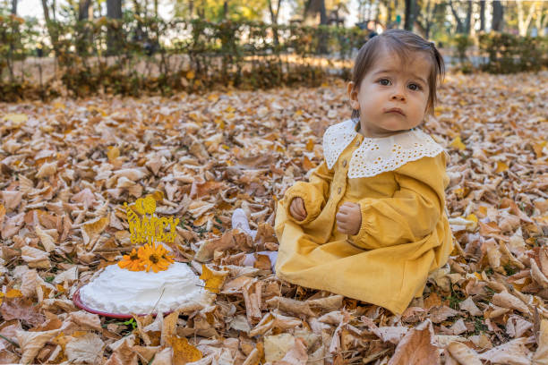 istock Little girl with birthday cake 1444804739